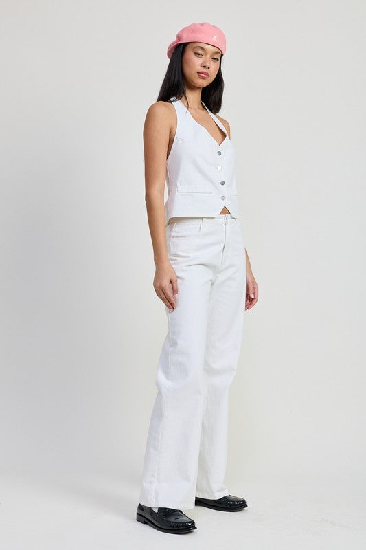 Folded fitted denim pants by Jade Icarus, showcasing their detailed stitching and classic denim texture.