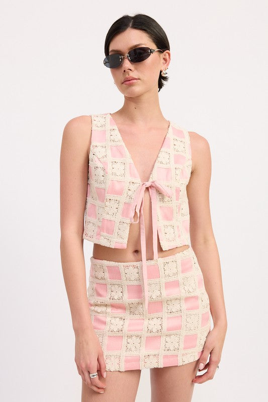Automotive Jade Icarus mini jacquard skirt with detailed woven pattern, showcasing fabric texture and intricate design.