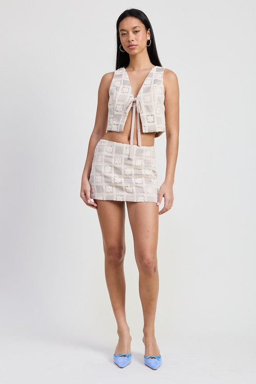 Jade Icarus MINI JACQUARD SKIRT for automotive use, featuring intricate jacquard fabric pattern and sleek design.