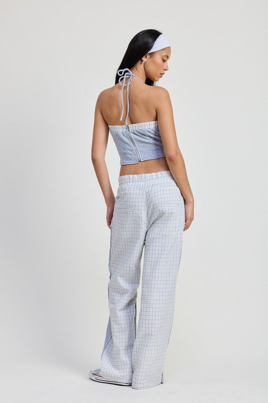 Jade Icarus double waist straight-leg pants in neutral fabric, shown on a model with a relaxed fit and tailored style.