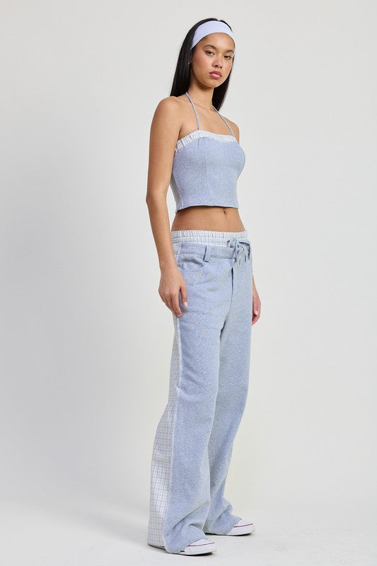 Jade Icarus double waist straight-leg pants in black fabric, featuring a high waist and tailored fit for a modern look.