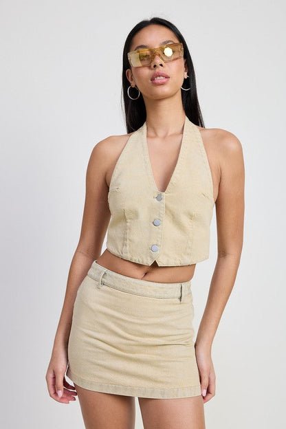 Jade Icarus denim mini skirt with tie-dye detail, showcasing casual style and vibrant pattern in a close-up shot.