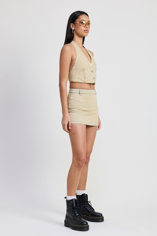Jade Icarus denim mini skirt with tie-dye detail, shown with a close-up of fabric and stylish design.