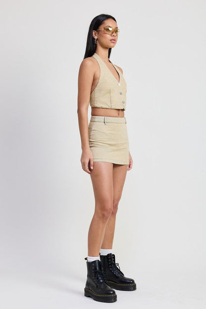 Jade Icarus denim mini skirt with tie-dye detail, shown with a close-up of fabric and stylish design.