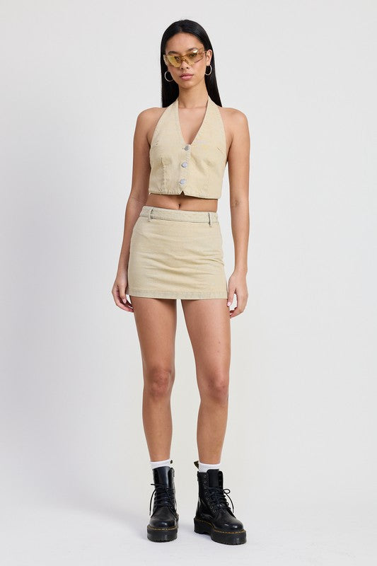 Automotive-themed denim mini skirt with tie-dye detail from Jade Icarus, featuring a casual, colorful design.