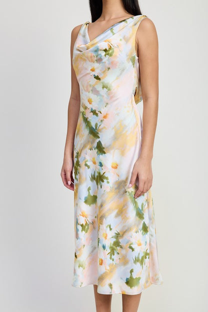 Jade Icarus floral midi cowl neck dress with a flowing silhouette and vibrant floral pattern, displayed on a mannequin.