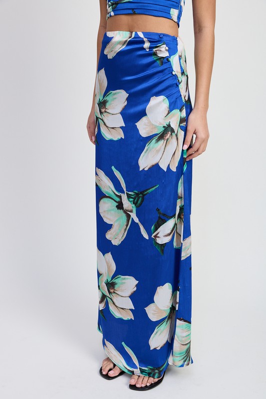 Automotive MAXI BIAS SKIRT by Jade Icarus, showcasing a sleek, black fabric design with detailed stitching and a smooth finish.