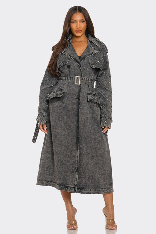 Distressed denim trench coat for automotive use by Jade Icarus, featuring rugged, weathered fabric and classic trench style.