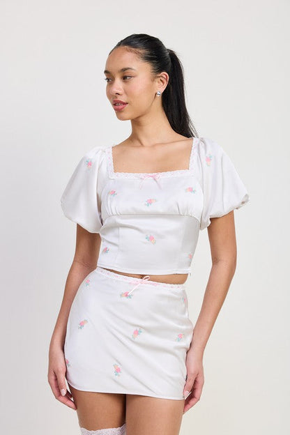 Automotive MINI Satin Bias Skirt by Jade Icarus featuring sleek satin fabric and modern bias cut design.