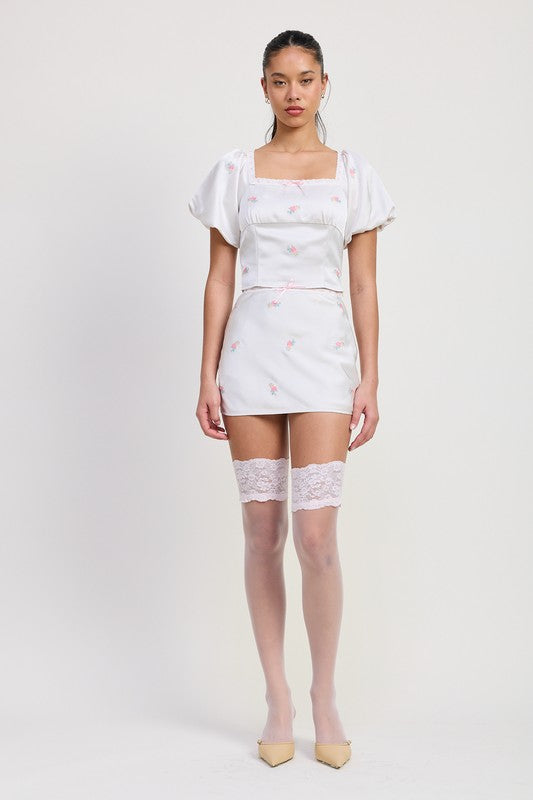 Jade Icarus MINI SATIN BIAS SKIRT for automotive, shown in a sleek satin fabric with a bias cut design.