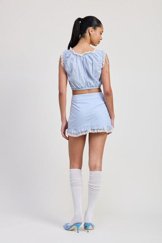 Automotive jade Icarus ruffled mini skirt with lace detail, featuring intricate lace accents and a stylish ruffled design.