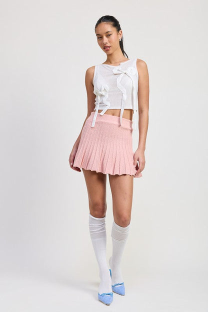 Jade Icarus pleated mini skirt designed for automotive use, featuring a sleek, stylish pleated fabric in a close-up view.