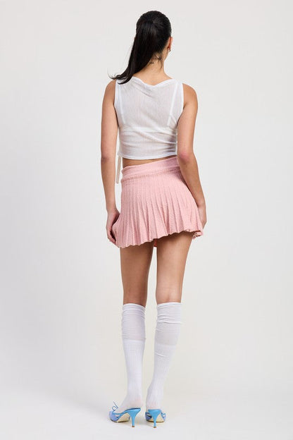 Automotive Jade Icarus pleated mini skirt with detailed pleats and stylish design, shown from a front view.