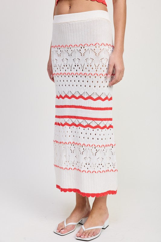 Automotive Jade Icarus Maxi Crochet Skirt with intricate crochet pattern and flowing design, displayed in a natural setting.