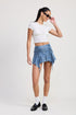 Jade Icarus ruffle mini skirt in lightweight fabric with a flouncy hem, styled for a trendy, feminine look.