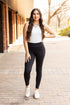 Jade Icarus Sleek Pocket Collection full-length automotive leggings, featuring a smooth black fabric and subtle pocket details.