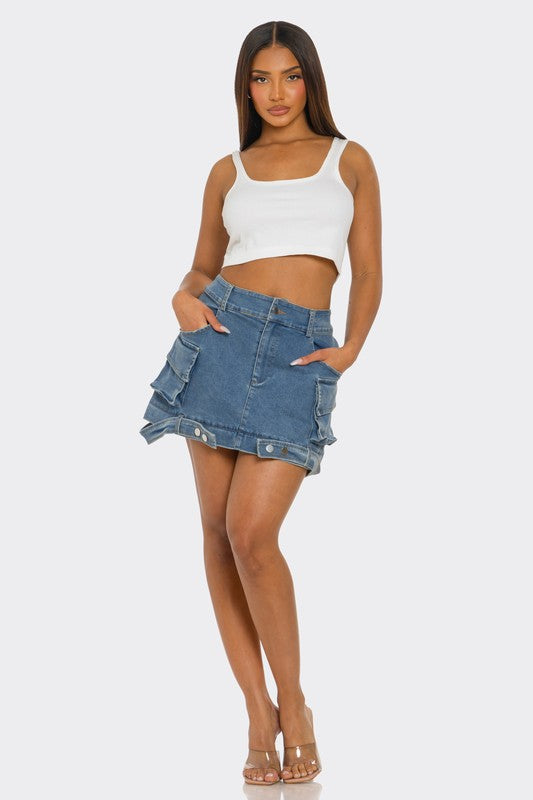 Jade Icarus utility denim maxi skirt with large pockets, styled in a casual outdoor setting.