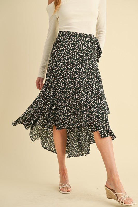 Jade Icarus Berti Floral Wrap Skirt with vibrant floral pattern and wrap design, showcased on a model.