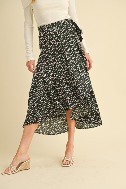 Automotive Berti Floral Wrap Skirt from Jade Icarus, showcasing vibrant floral patterns and wrap design.