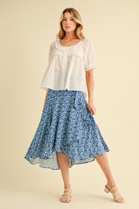 Jade Icarus Berti Floral Wrap Skirt with automotive-inspired floral pattern, displayed on a neutral background.