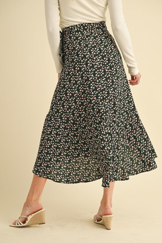 Jade Icarus Berti Floral Wrap Skirt with vibrant floral pattern and wrap design, displayed on a mannequin.