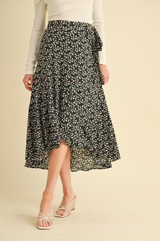 Jade Icarus Berti Floral Wrap Skirt with vibrant floral pattern, automotive-inspired design, and flowing wrap style.