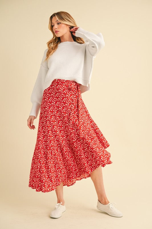 Jade Icarus Berti Floral Wrap Skirt in vibrant floral pattern, showcasing fabric details and wrap design.
