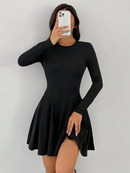 Green Alcestis dress featuring a stylish design, lightweight fabric, and a flattering fit perfect for casual or semi-formal occasions.