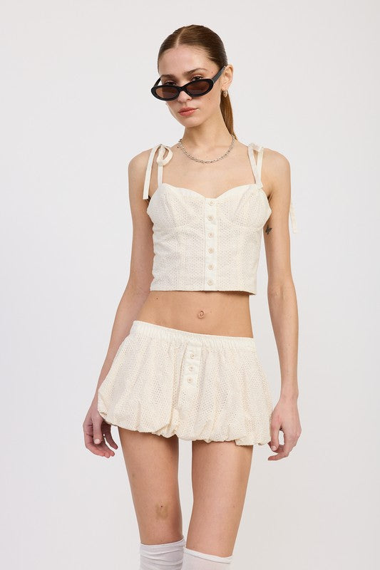 Automotive Bubble Mini Skirt with elastic waistband by Jade Icarus, shown in the image.