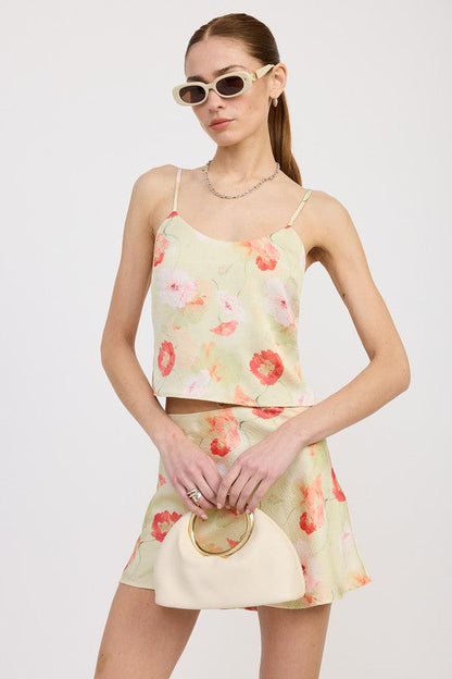 Automotive BIAS CUT MINI SATIN SKIRT by Jade Icarus, showcasing sleek satin fabric and a stylish bias cut design.