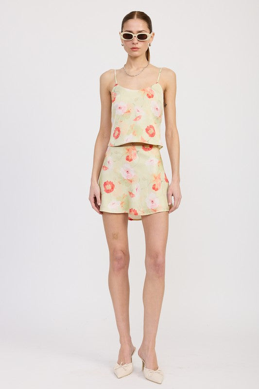 Jade Icarus bias cut mini satin skirt with sleek, shiny fabric and smooth finish, displayed on a plain background.