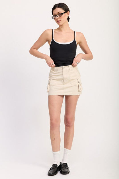Jade Icarus cargo mini skirt for automotive styling, featuring a sleek design and durable fabric, shown in a close-up view.