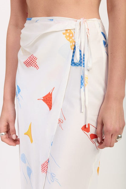 Automotive printed satin midi skirt with side ruffle detail by Jade Icarus, shown in a stylish fabric close-up.