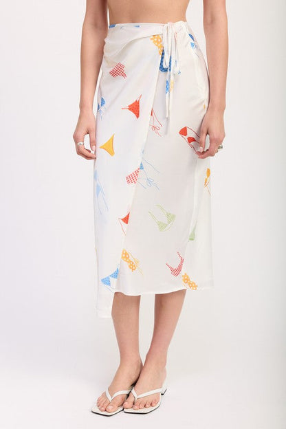 Automotive-themed satin midi skirt with side ruche by Jade Icarus, featuring printed design and elegant fabric details.