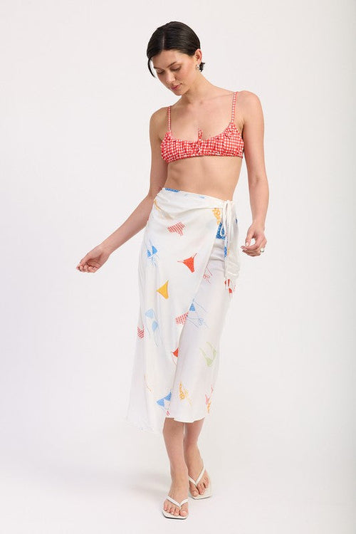 Automotive-themed satin midi skirt with side ruche by Jade Icarus, featuring printed design and elegant fabric details.