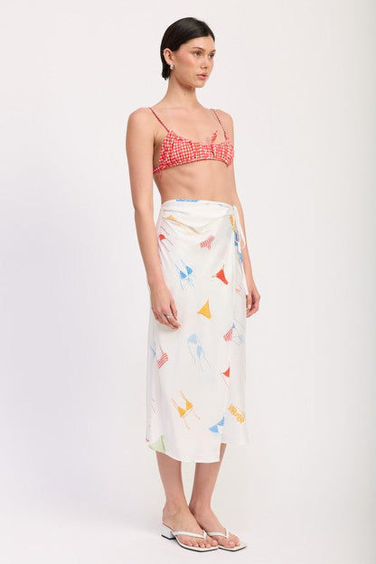 Automotive print satin midi skirt with side ruche by Jade Icarus, showcasing the elegant fabric and stylish design.