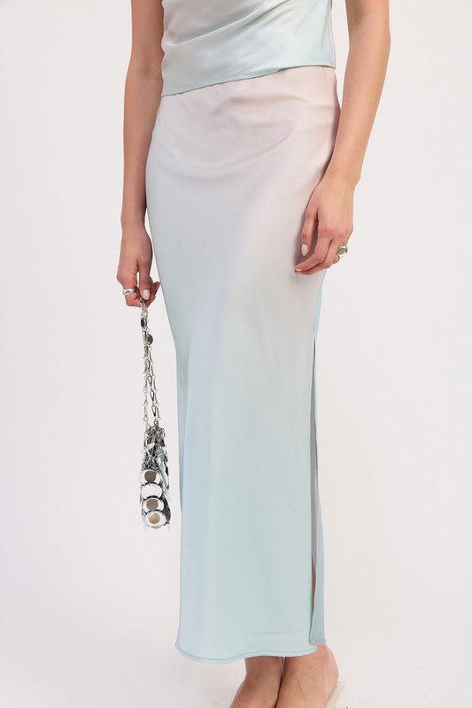 Automotive bias maxi skirt by Jade Icarus featuring sleek design and fabric details, displayed on a neutral background.