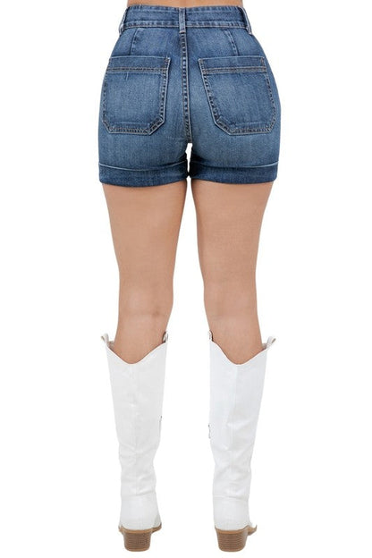 Dark wash Willow Denim Short by Jade Icarus, automotive accessory with denim-style design, shown in a close-up image.