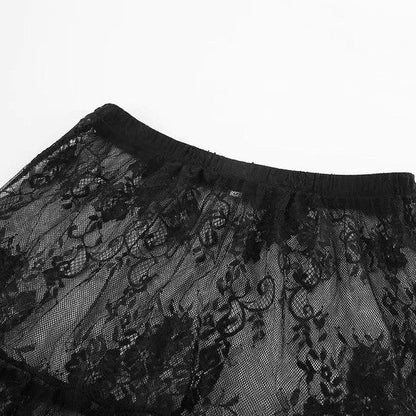 Floral lace ruffled maxi skirt by Jade Icarus, showcasing intricate lace details and flowing ruffle design.