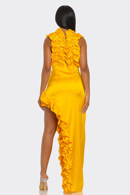Jade Icarus Golden Hour Ruffle Gown for women, flowing fabric with ruffle details, elegant and stylish evening dress.