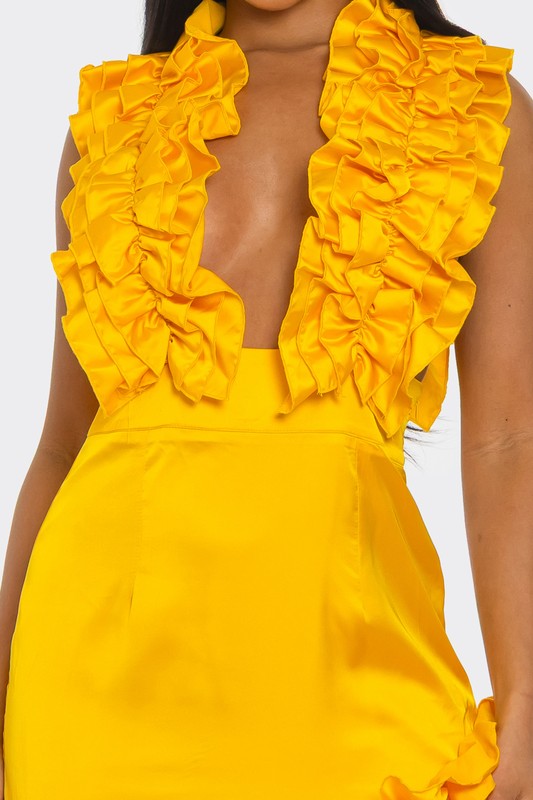 Jade Icarus Golden Hour Ruffle Gown for women, flowing fabric with ruffle details, perfect for elegant occasions.