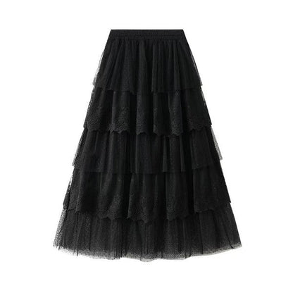 Automotive layered lace midi skirt by Jade Icarus featuring intricate lace detail and flowing design on a neutral background.