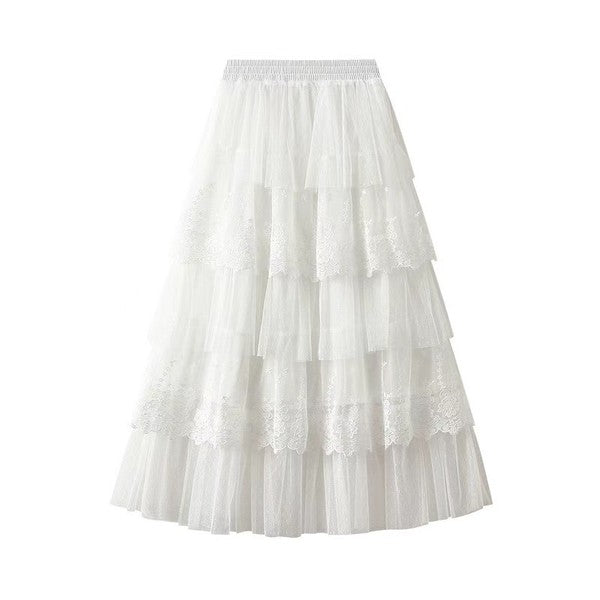 Elegant layered lace midi skirt by Jade Icarus with intricate lace details and a flowing silhouette.