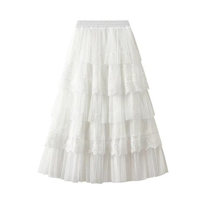 Elegant layered lace midi skirt by Jade Icarus with intricate lace details and a flowing silhouette.