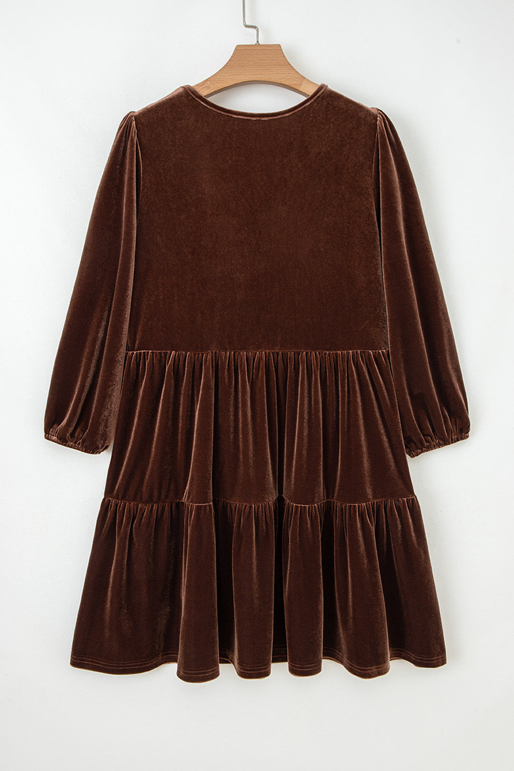 Velvet V-neck long sleeve tiered mini dress for women by Byzantium Bay, featuring a stylish, flowy silhouette and elegant design.