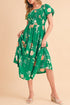 Green tiered lightweight midi dress for women by Jade Icarus, flowing fabric with a stylish tiered design.