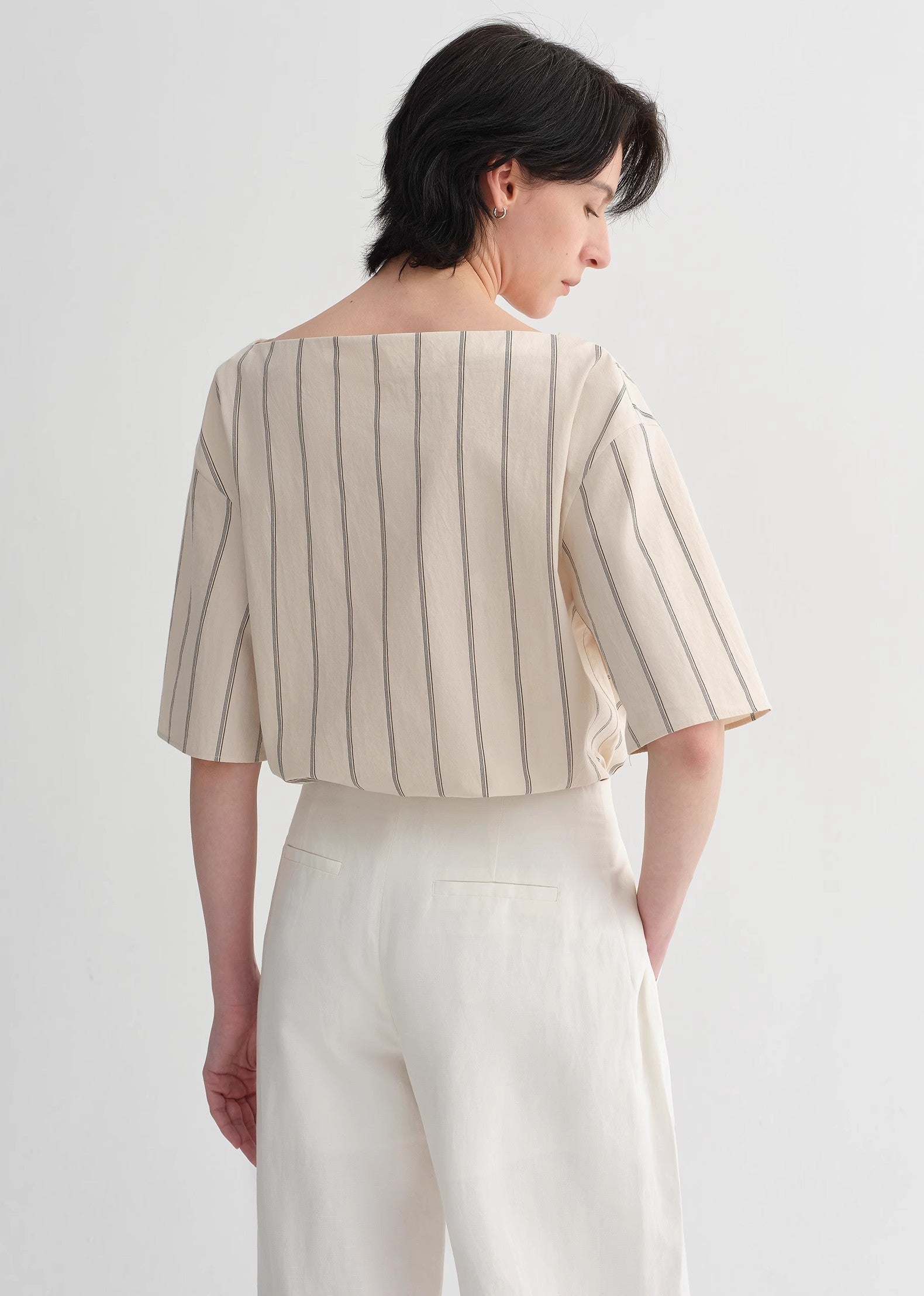 Brown Coeus high-quality cotton jacket with a relaxed fit, featuring simple design and long-staple cotton fabric.