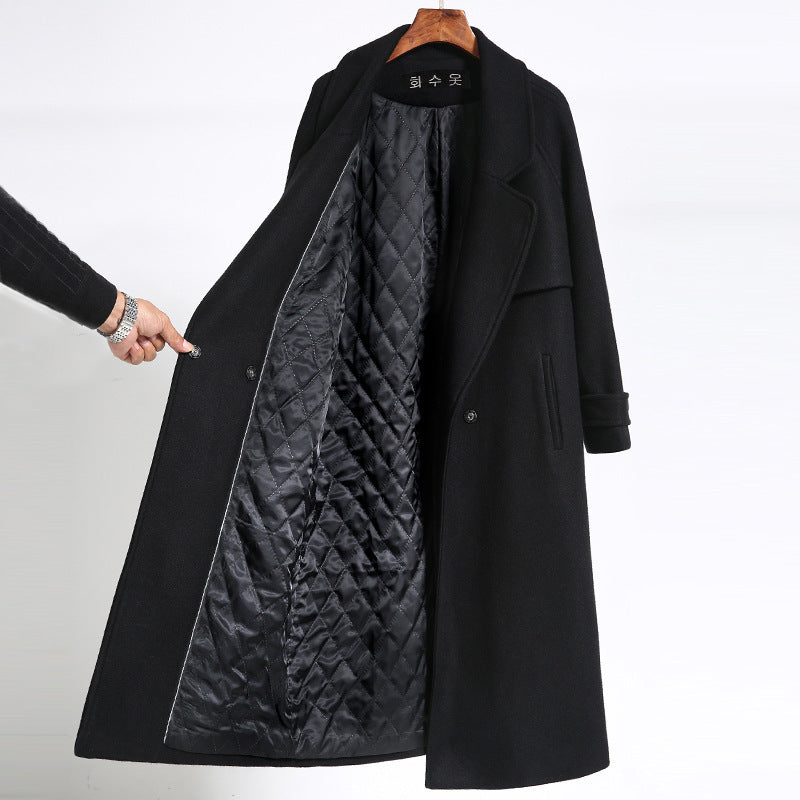 Black silhouette overcoat by Carmine Juneberry, Haute Edition 25, stylish jacket with a classic overcoat design.