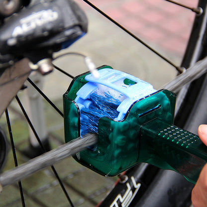 Maroon Asteria bicycle chain cleaner scrubber brush for cycling maintenance, featuring a durable handle and cleaning bristles.