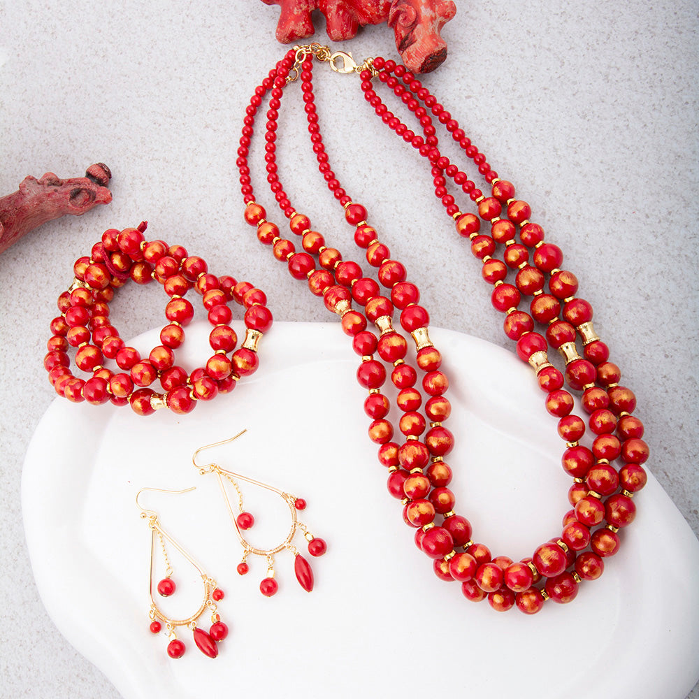 Red Mashan Jade Golden Chandelier Earrings with intricate jewelry design and gold accents, showcasing elegant craftsmanship.